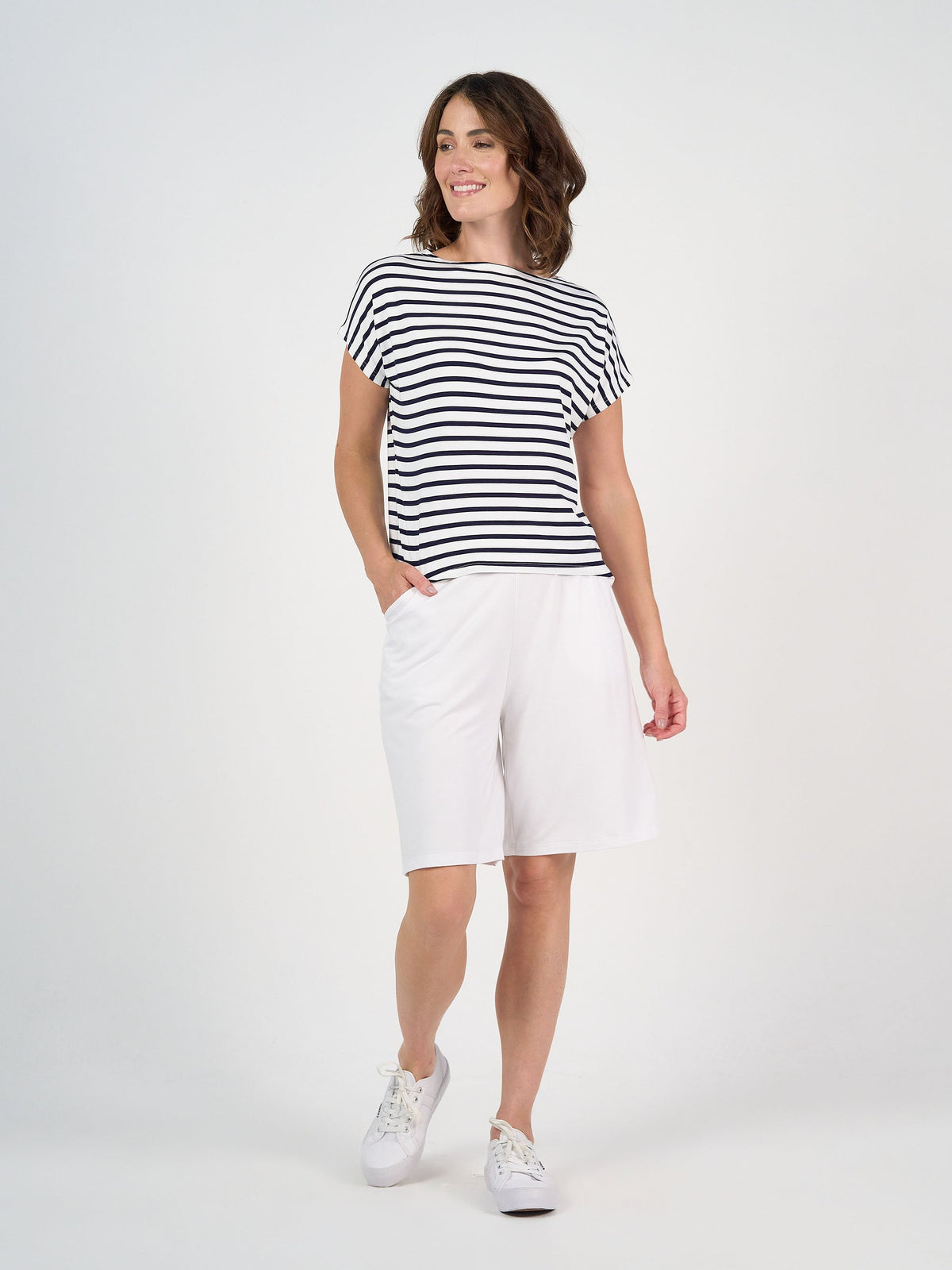 Image of a model wearing Tops. Product name - Wilde Bamboo Box Fit Tee Navy & White Stripe in Navy & White Stripe colour by brand - Lou Lou