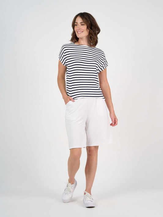 Image of a model wearing Tops. Product name - Wilde Bamboo Box Fit Tee Navy & White Stripe in Navy & White Stripe colour by brand - Lou Lou