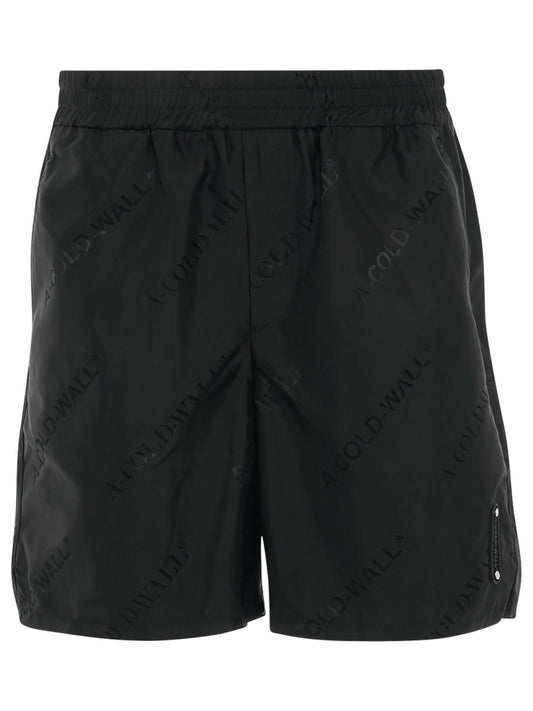 Image of a model wearing Shorts. Productname: A-COLD-WALL Monogram Shorts in BLACK colour by brand - A-COLD-WALL