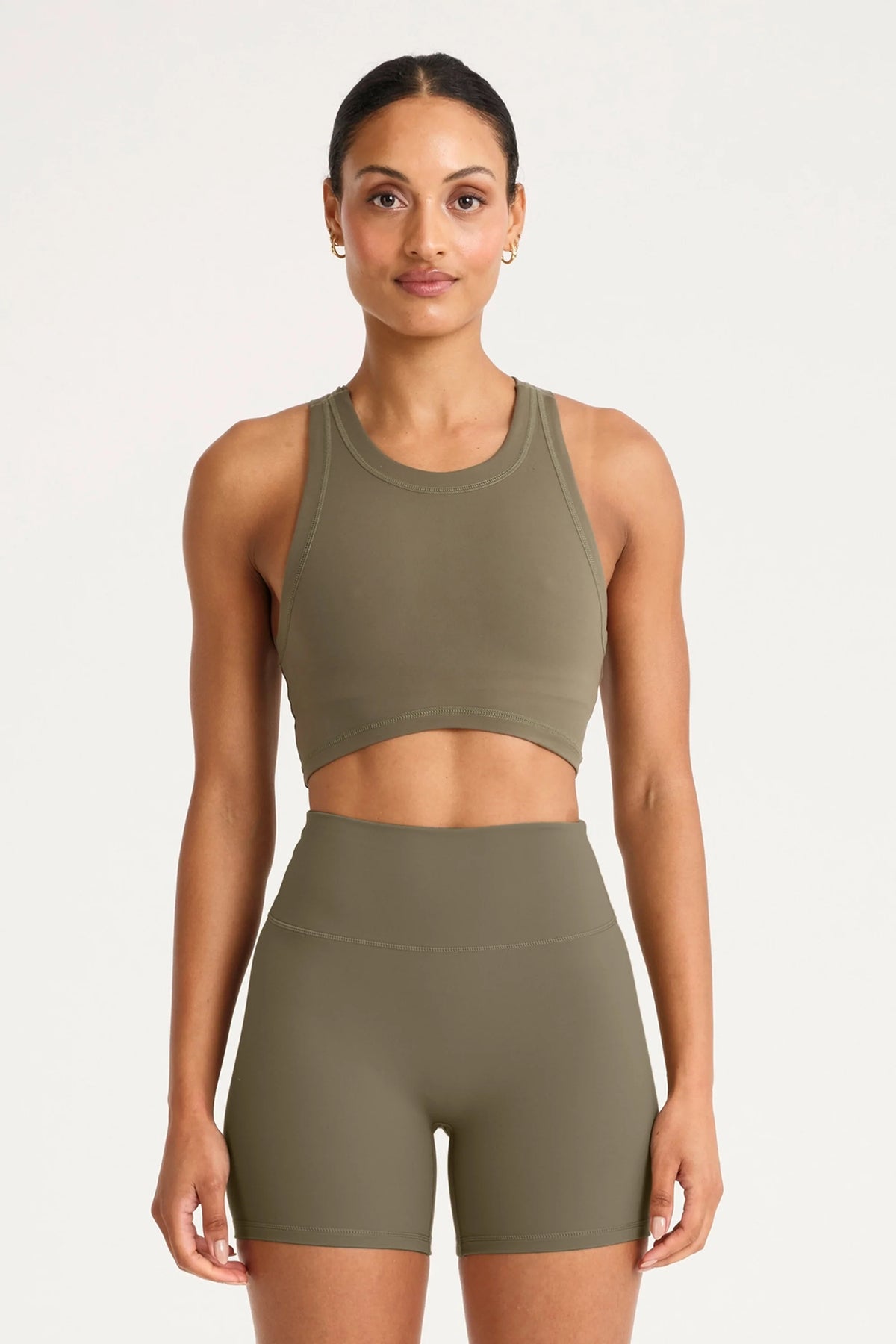 Image of Activewear. Product name - ALLFENIX CloudCore High Neck Longline Sports Bra in Olive colour by brand - All Fenix
