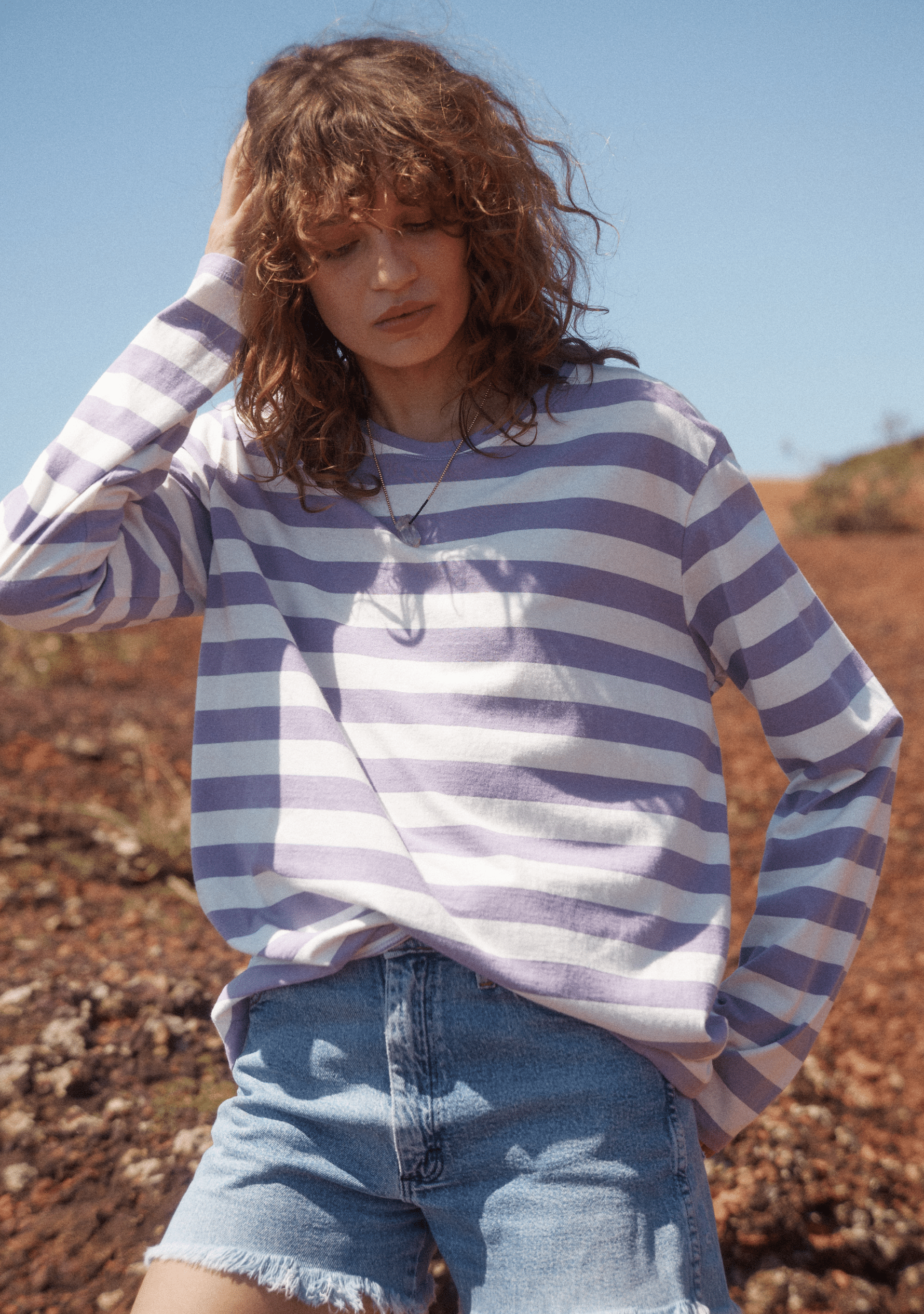 Image of a model wearing Tops. Productname: Auguste The Label Alden North Long Sleeve Tee in Purple colour by brand - Auguste The Label