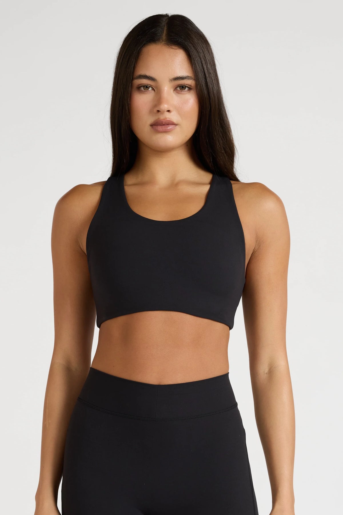 Image of Activewear. Product name - EcoSculpt Racer Sports Bra in Black colour by brand - All Fenix