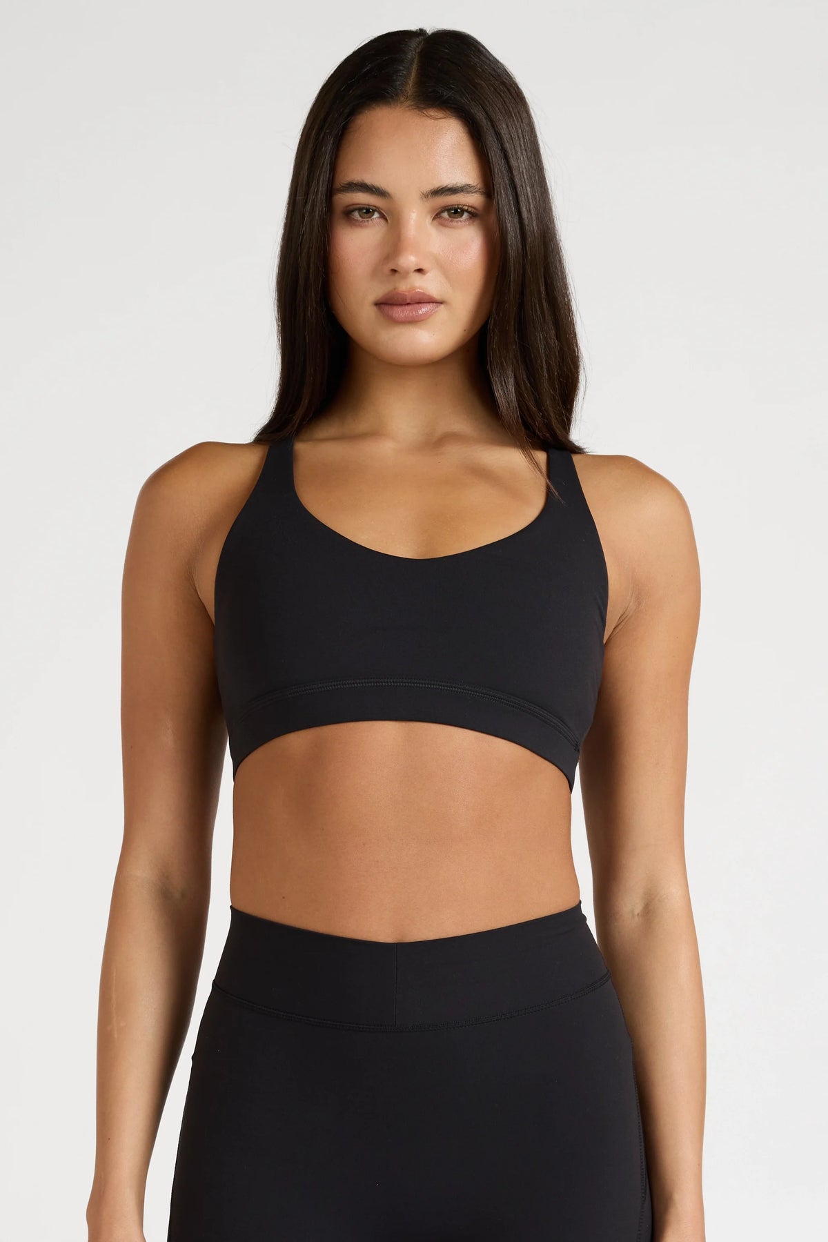 Image of Activewear. Product name - EcoSculpt Cross Back Sports Bra in Black colour by brand - All Fenix