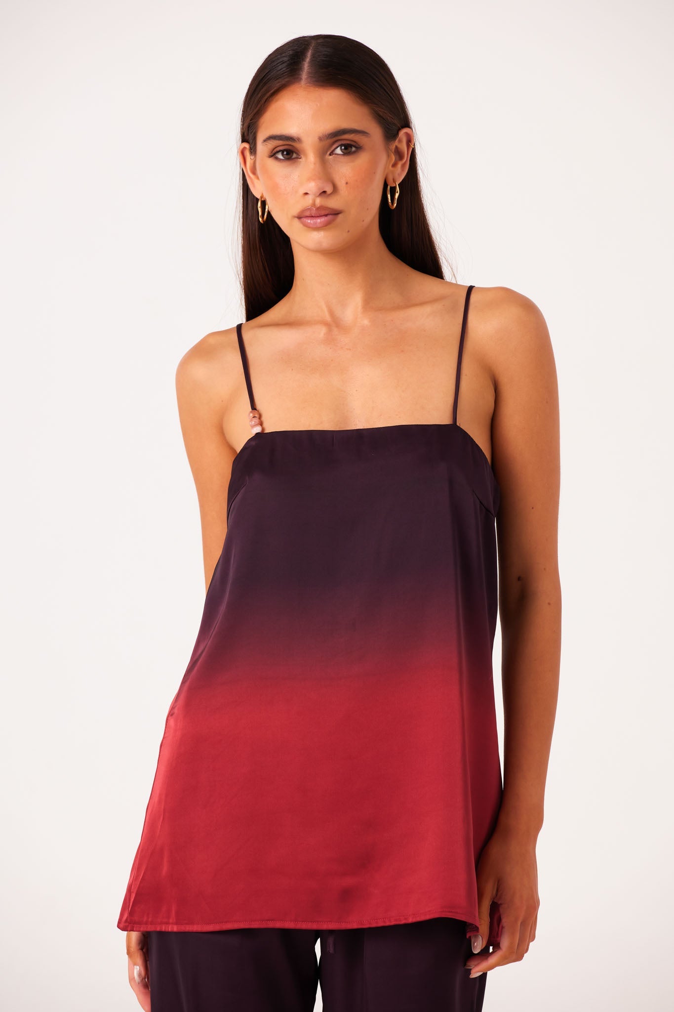 Image of a model wearing Tops. Productname: SNDYS AMAYA LONGLINE TOP in Plum Ombre colour by brand - SNDYS