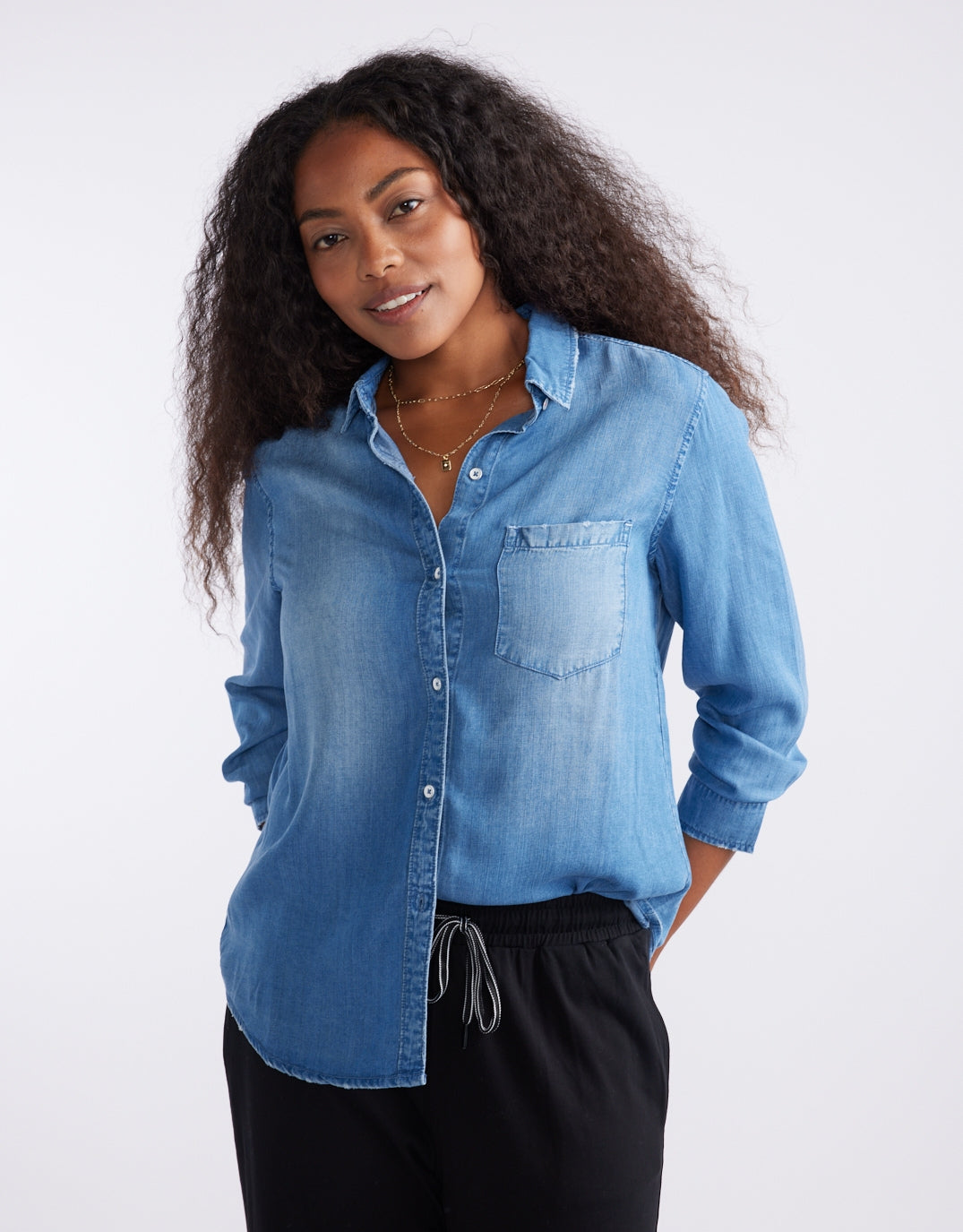 Image of a model wearing Tops. Productname: Ava Vintage Shirt - in Denim colour by brand - White & Co.