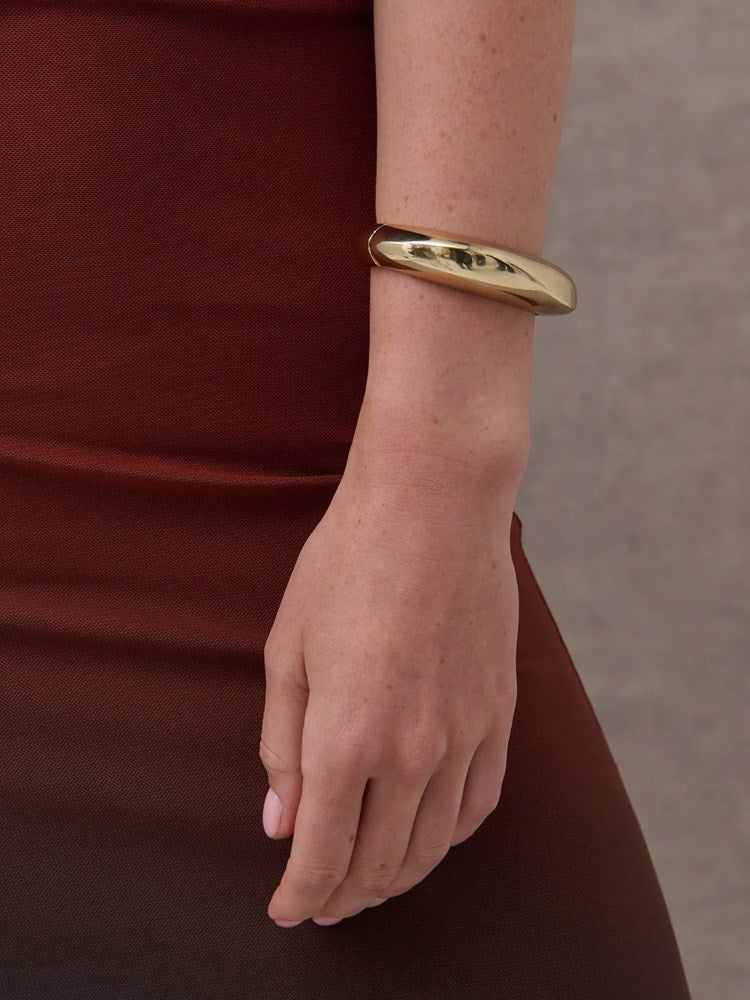 Image of Jewelry. Product name - Sculpted Metal Cuff Bangle Gold in Gold colour by brand - Betty Basics