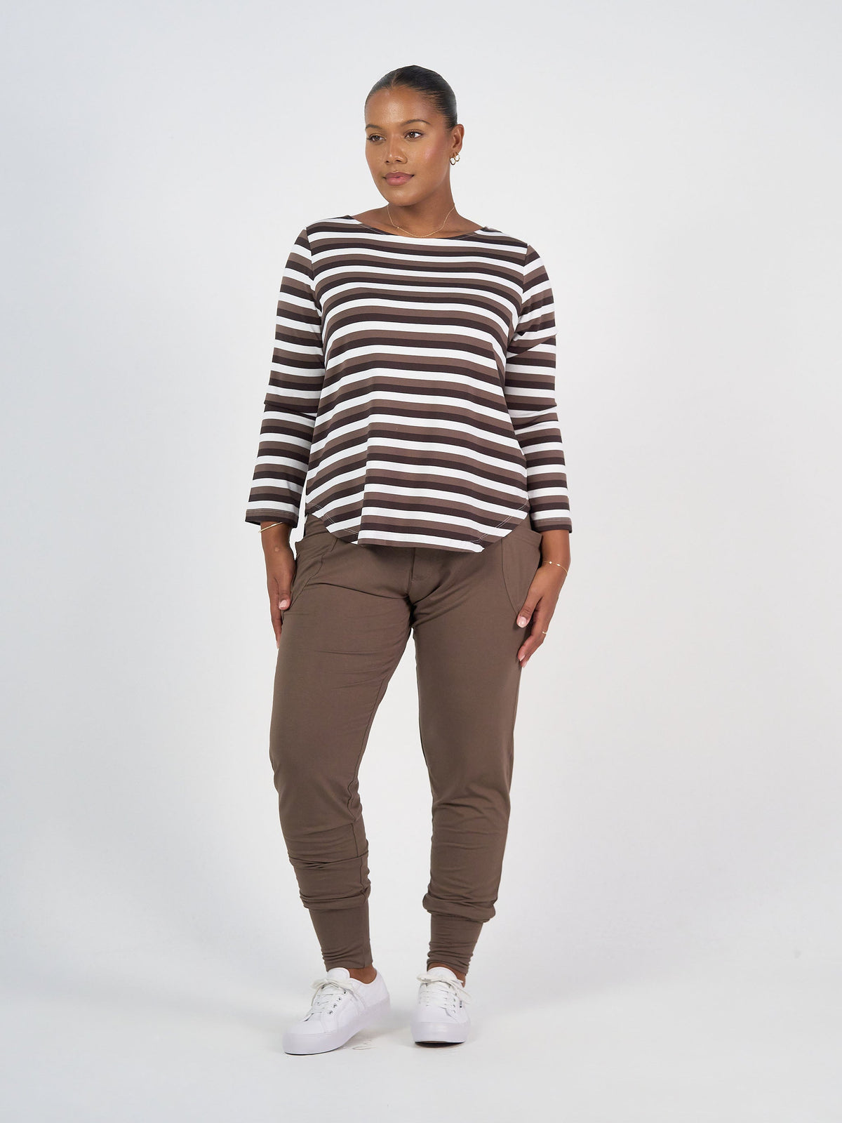 Image of a model wearing Tops. Product name - Adele Long Sleeve Bamboo Top Brown Stripe in Brown Stripe colour by brand - Lou Lou