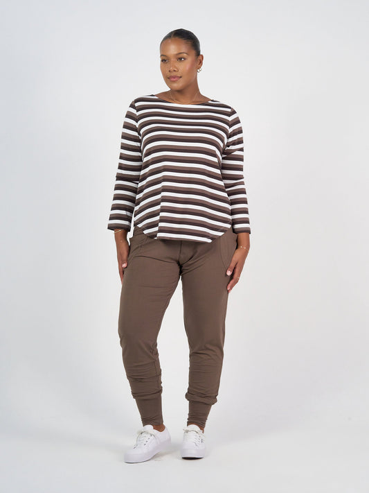 Image of a model wearing Tops. Product name - Adele Long Sleeve Bamboo Top Brown Stripe in Brown Stripe colour by brand - Lou Lou