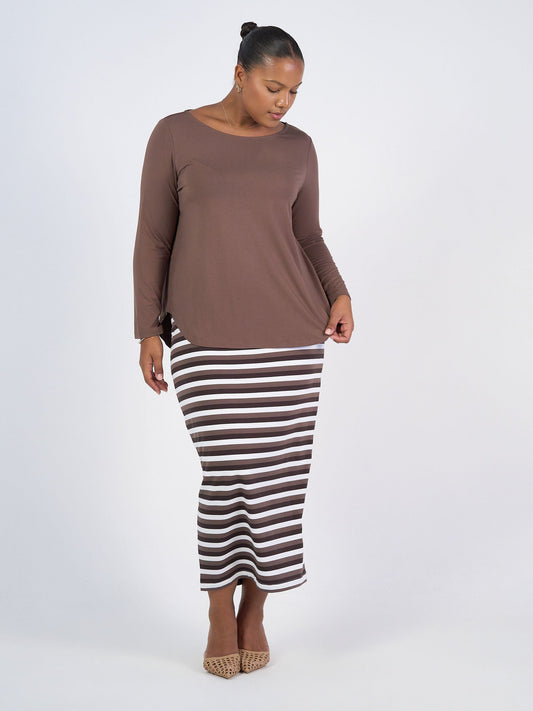 Image of a model wearing Tops. Product name - Adele Long Sleeve Bamboo Top Chocolate in Chocolate colour by brand - Lou Lou