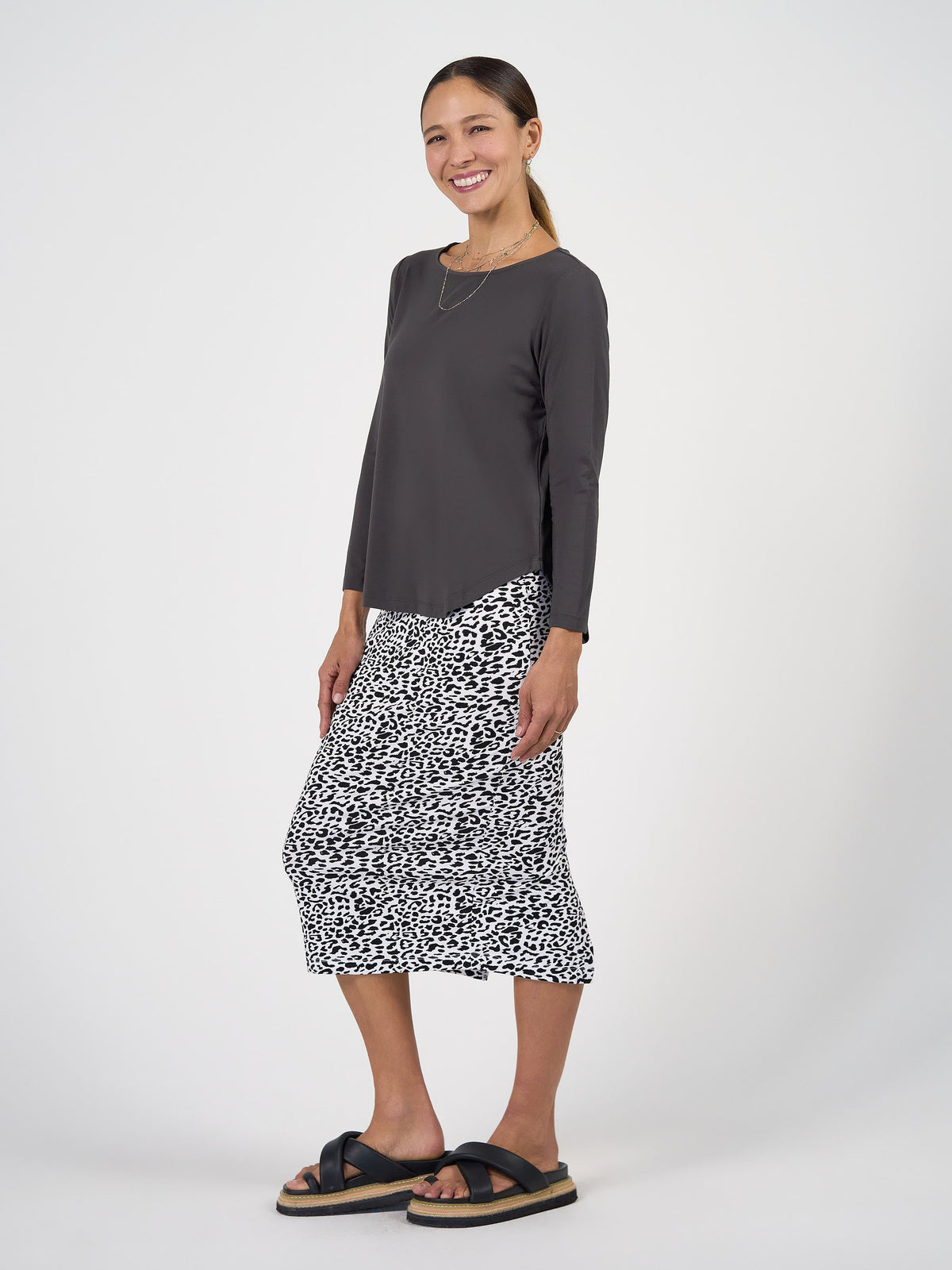 Image of a model wearing Tops. Product name - Adele Long Sleeve Bamboo Top Steel in Steel colour by brand - Lou Lou