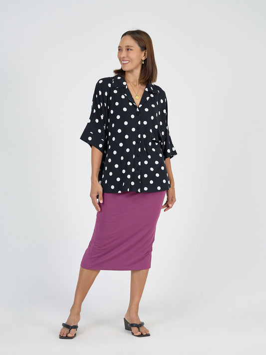 Image of a model wearing Tops. Product name - Alanis 3/4 Sleeve Collared Bamboo Shirt Polka Dot in Polka Dot colour by brand - Lou Lou