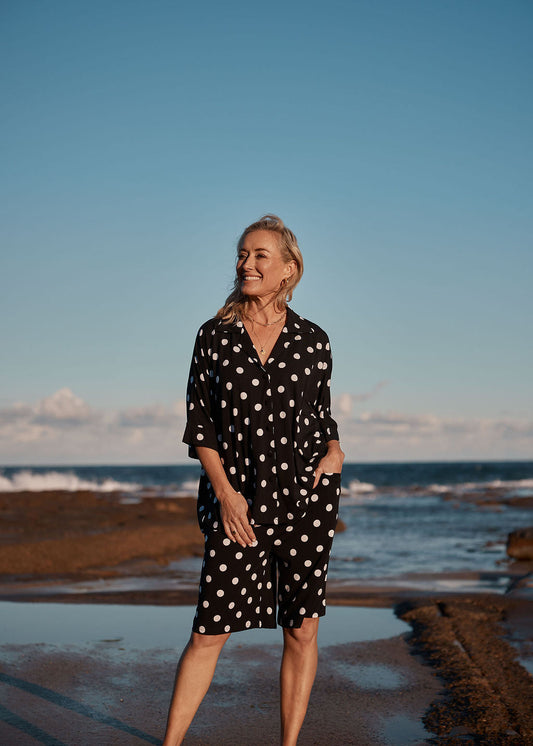 Image of a model wearing Shorts. Product name - Simone Wide Leg Bamboo Shorts Polka Dot in Polka Dot colour by brand - Lou Lou