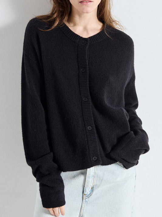 Image of a model wearing Outerwear. Productname: AMERICAN VINTAGE DAMSVILLE CARDIGAN in Black colour by brand - American Vintage