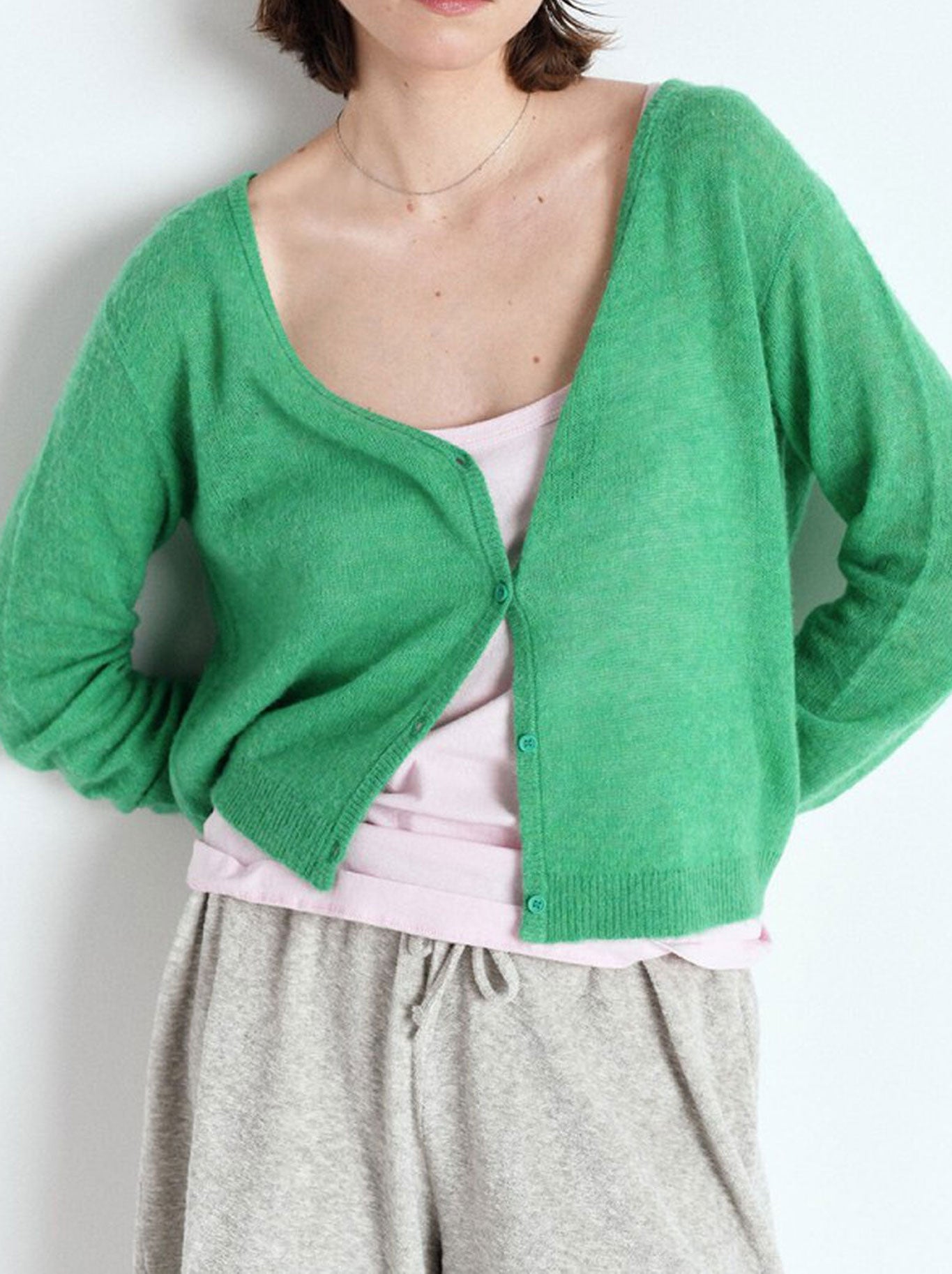 Image of a model wearing Outerwear. Productname: AMERICAN VINTAGE DUMY FINE CARDI in Green colour by brand - American Vintage