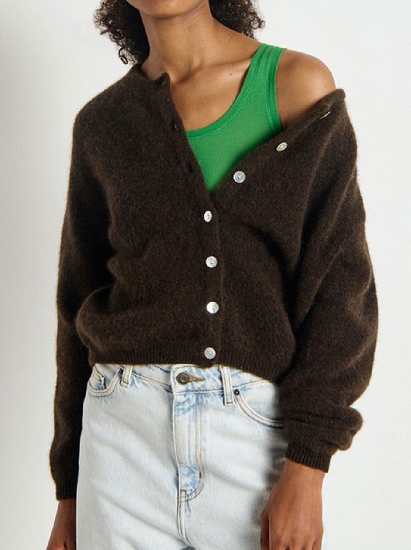 Image of a model wearing Outerwear. Product name - AMERICAN VINTAGE VITOW CARDIGAN in Coffee Melange colour by brand - American Vintage
