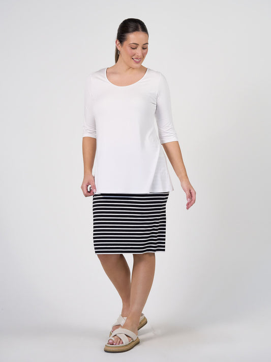 Image of a model wearing Tops. Product name - Aretha 3/4 Sleeve Bamboo Top White in White colour by brand - Lou Lou