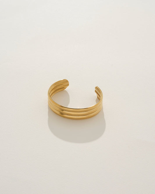 Image of Bracelets. Product name - Aria Bangle in Gold in colour by brand - Reliquia Jewellery