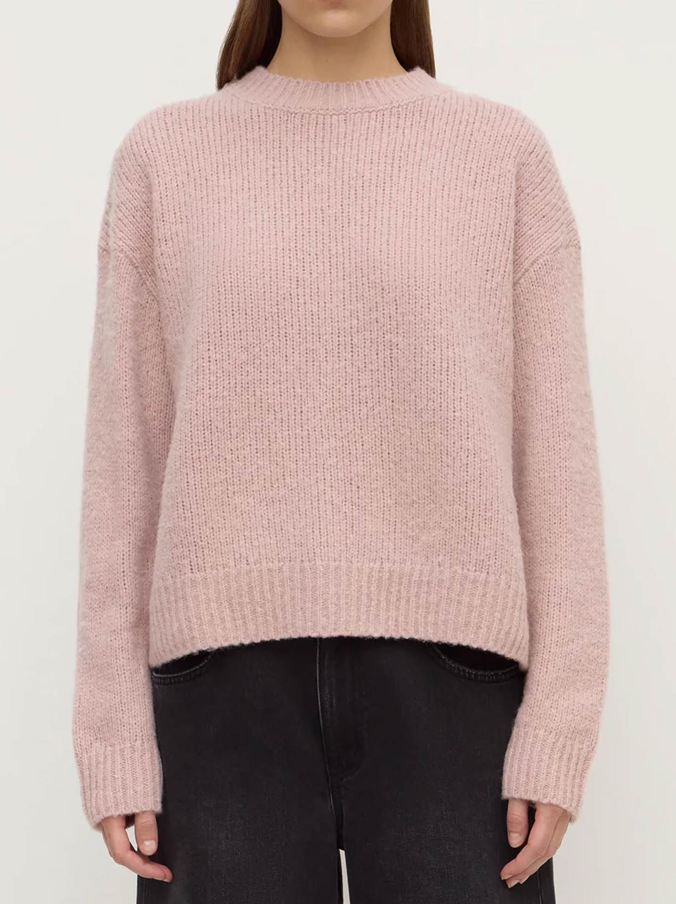 Image of a model wearing Outerwear. Product name - ASSEMBLY LABEL ARIEL KNIT in Blush colour by brand - Assembly Label