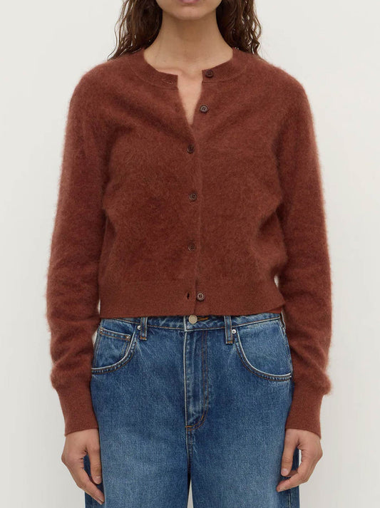 Image of a model wearing Outerwear. Product name - ASSEMBLY LABEL CARINA MERINO WOOL CARDI in Amber colour by brand - Assembly Label