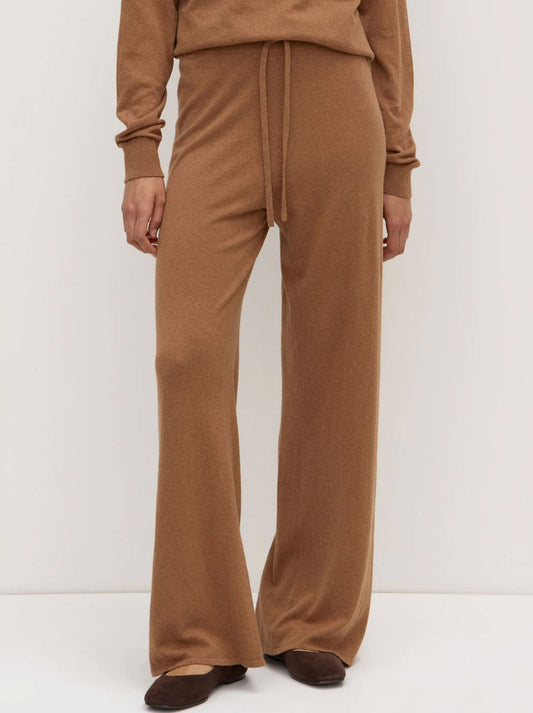 Image of a model wearing Pants. Productname: ASSEMBLY LABEL COTTON LOUNGE PANT in Fawn colour by brand - Assembly Label