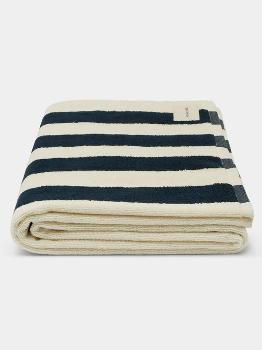 Image of Accessories. Productname: ASSEMBLY LABEL COTTON BEACH TOWEL in Navy/Cream colour by brand - Assembly Label