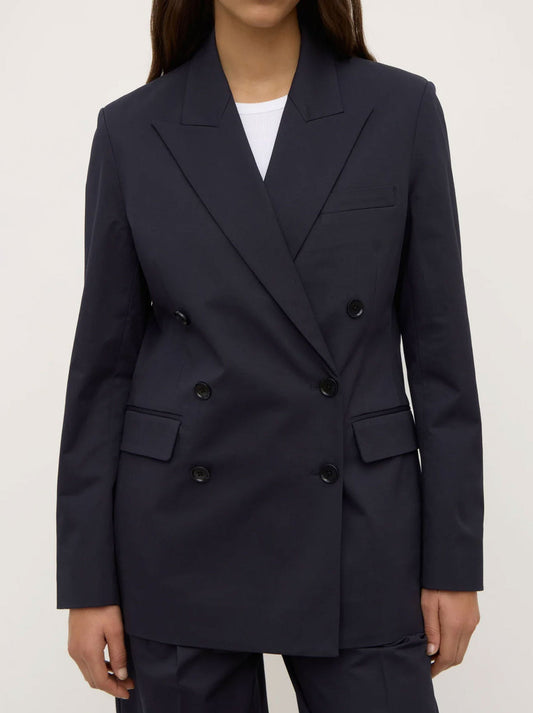 Image of a model wearing Outerwear. Productname: ASSEMBLY LABEL ELLEN DOUBLE BREASTED BLAZER in True Navy colour by brand - Assembly Label
