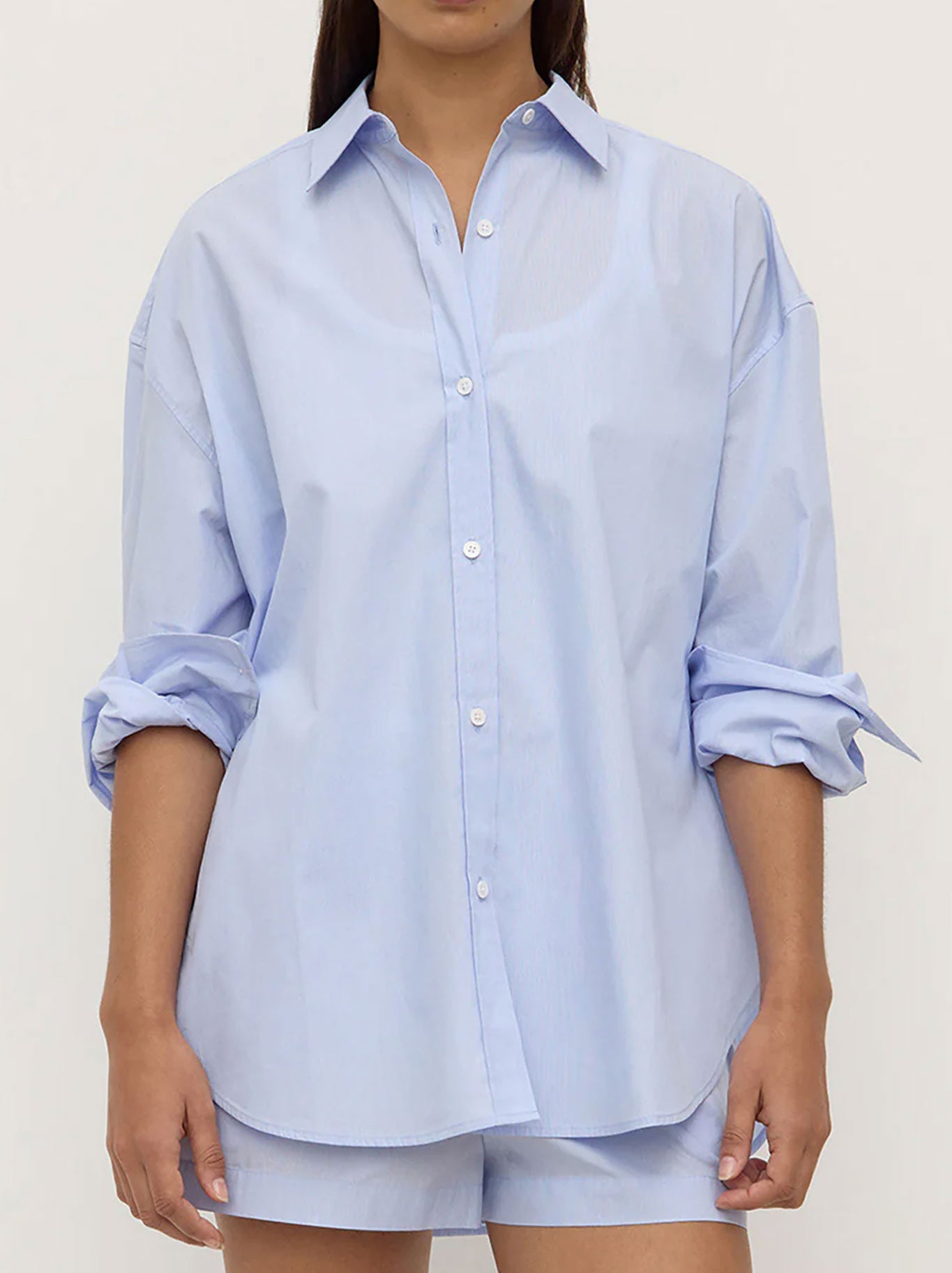 Image of a model wearing Tops. Productname: ASSEMBLY LABEL HAVANA STRIPE LONG SLEEVE SHIRT in Blue White Stripe colour by brand - Assembly Label