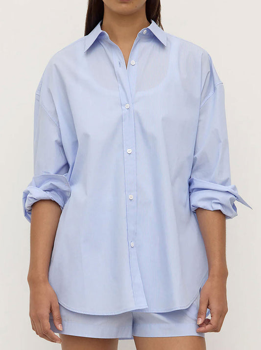 Image of a model wearing Tops. Productname: ASSEMBLY LABEL HAVANA STRIPE LONG SLEEVE SHIRT in Blue White Stripe colour by brand - Assembly Label