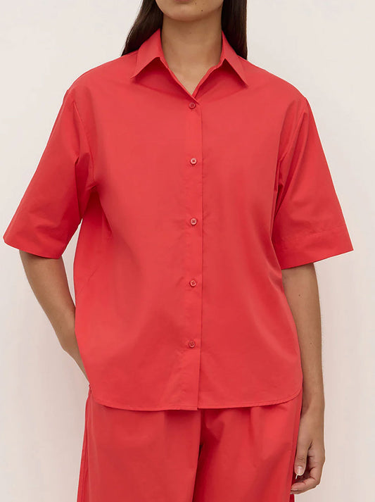 Image of a model wearing Tops. Productname: ASSEMBLY LABEL JONI SHORT SLEEVE SHIRT in Chilli colour by brand - Assembly Label