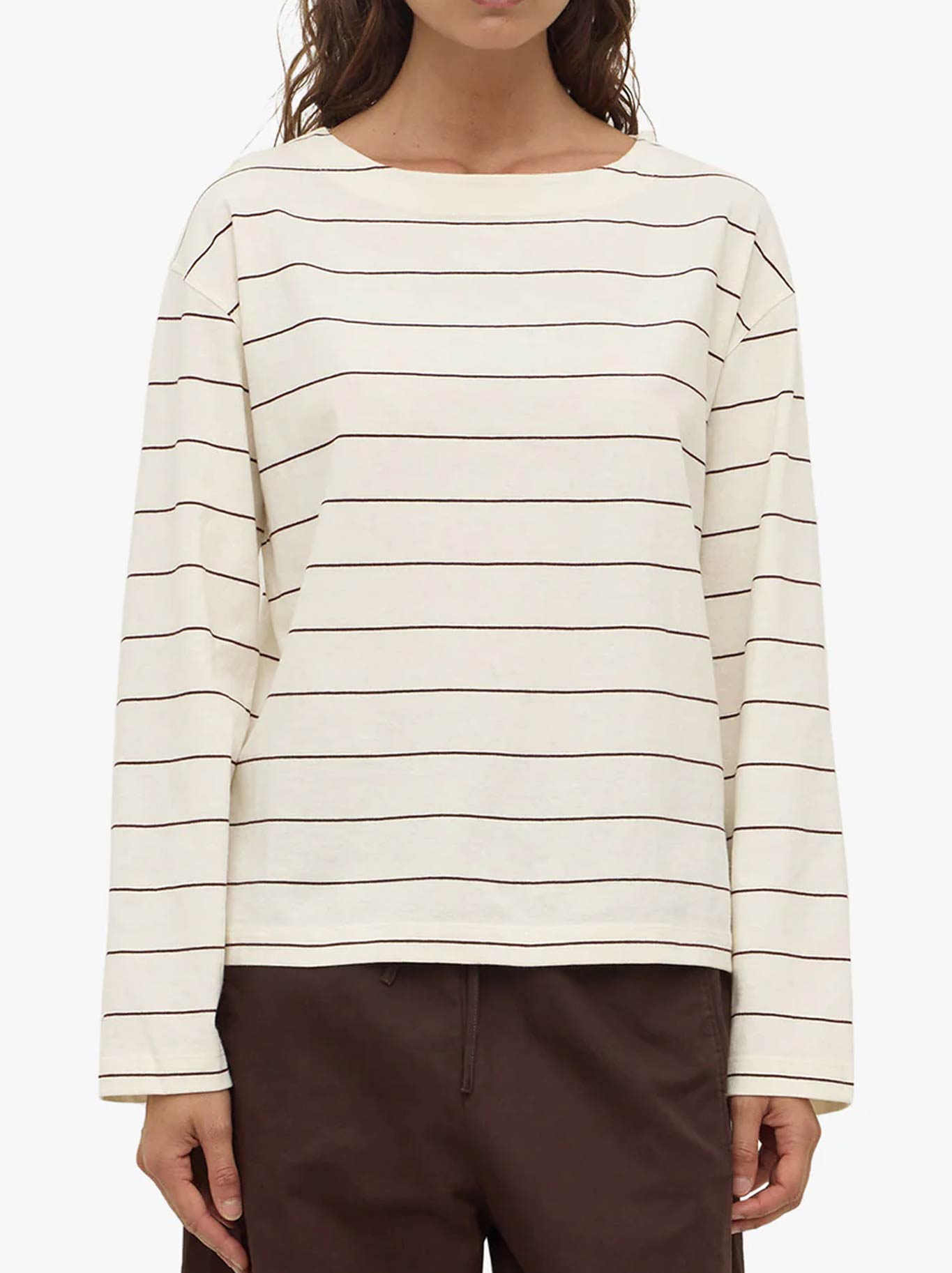 Image of a model wearing Tops. Productname: ASSEMBLY LABEL SCOUT LONG SLEEVE TEE in Cream Mulberry colour by brand - Assembly Label