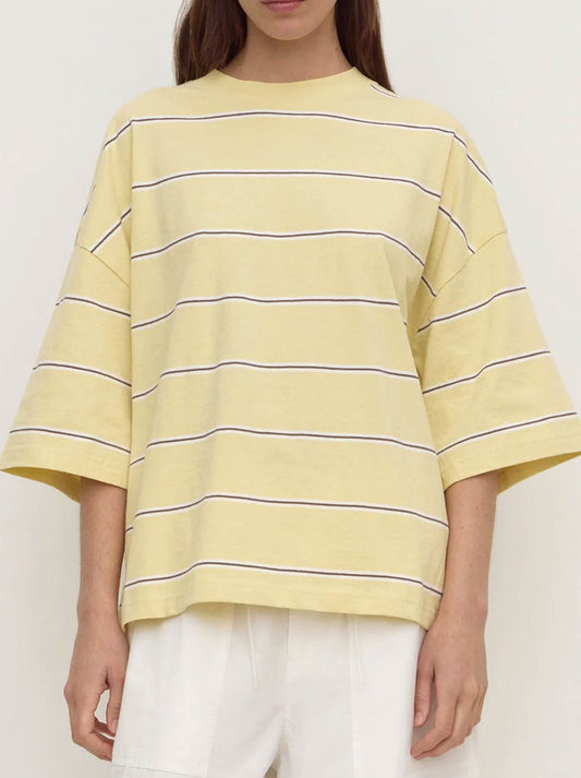 Image of a model wearing Tops. Product name - ASSEMBLY LABEL NORA STRIPE OVERSIZE TEE in Rind colour by brand - Assembly Label