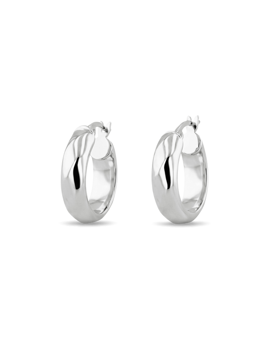 Image of Earrings. Product name - Aura Silver Hoop Earrings in colour by brand - LAVANA