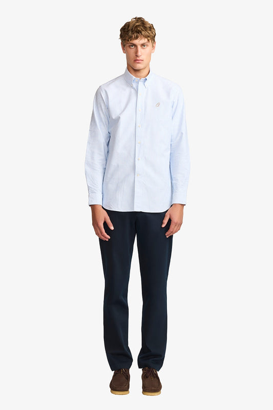 Image of a model wearing Pants. Product name - Austin + Navy Chino in Navy colour by brand - Anthony Squires