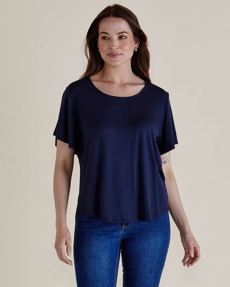 Image of a model wearing Tops. Productname: Betty Basics Everleigh Bamboo Tee Navy in Navy colour by brand - Betty Basics