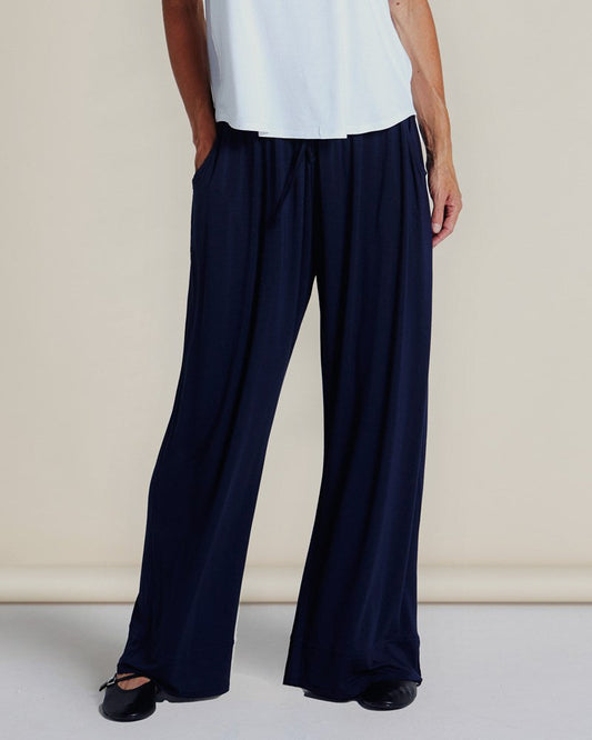 Image of a model wearing Pants. Productname: Betty Basics Ginnie Bamboo Pant Navy in Navy colour by brand - Betty Basics