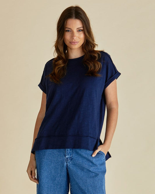 Image of a model wearing Tops. Productname: Betty Basics Shirley Short Sleeve Tee Navy in Navy colour by brand - Betty Basics