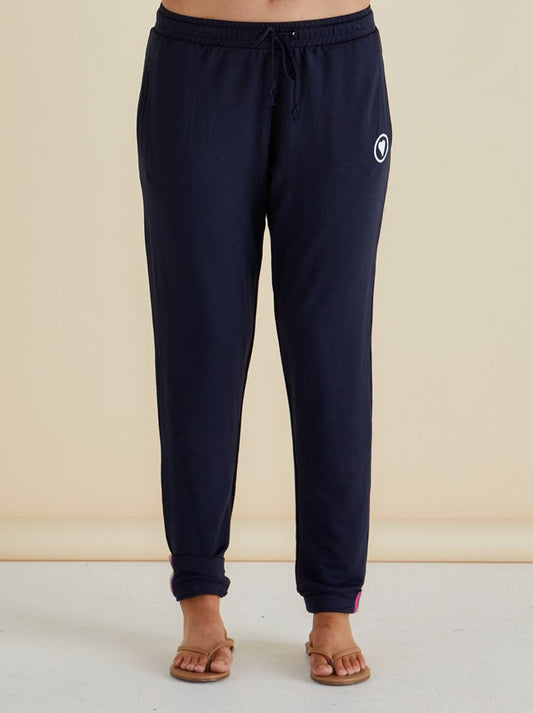 Image of a model wearing Pants. Productname: Betty Basics McCartney Jogger Navy in Navy colour by brand - Betty Basics