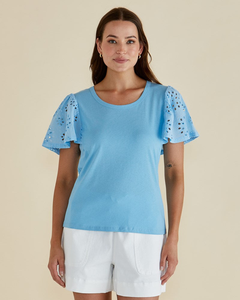 Image of a model wearing Tops. Productname: Betty Basics Lottie Embroidered Tee Baby Blue in Baby Blue colour by brand - Betty Basics