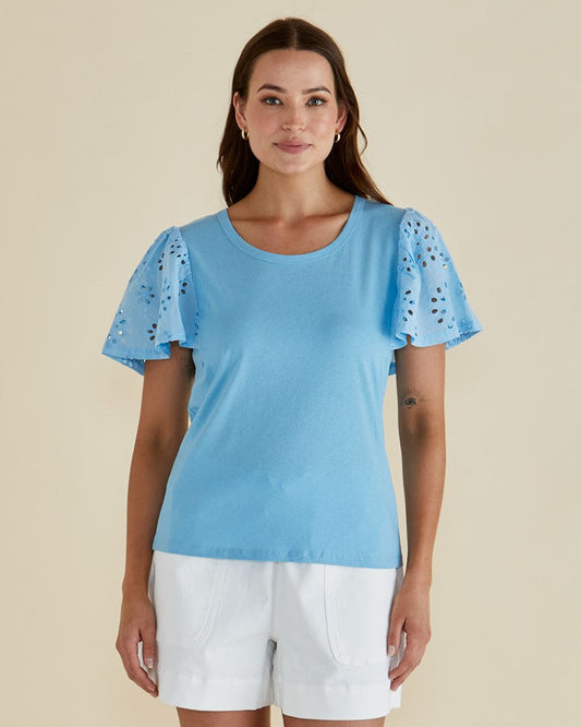 Image of a model wearing Tops. Productname: Betty Basics Lottie Embroidered Tee Baby Blue in Baby Blue colour by brand - Betty Basics
