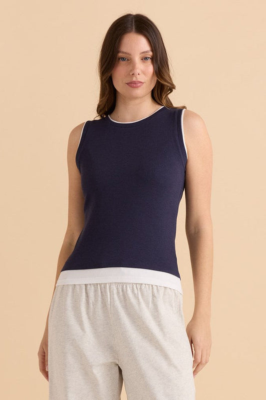 Image of a model wearing Tops. Productname: Betty Basics Thea Tank Top Navy in Navy colour by brand - Betty Basics