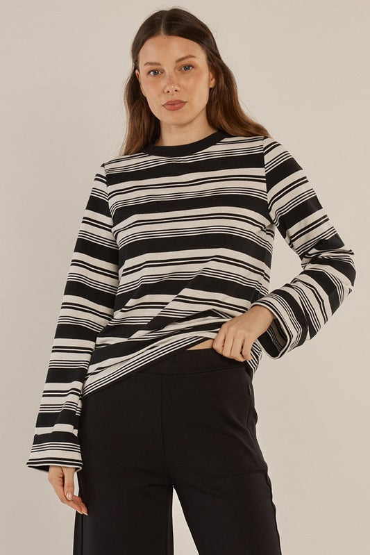 Image of a model wearing Tops. Product name - Arden Top Black/White Stripe in Black/White Stripe colour by brand - Betty Basics