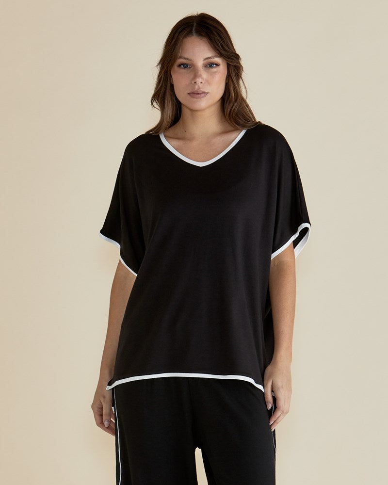 Image of T-Shirts. Product name - Clara Tee Black in Black colour by brand - Betty Basics