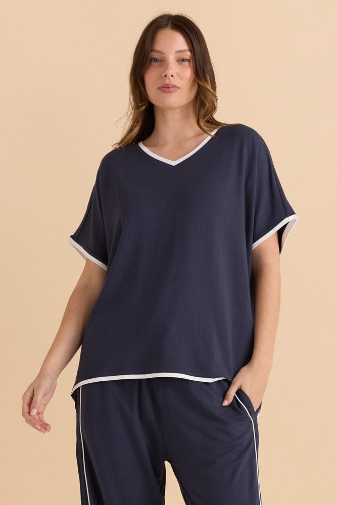 Image of a model wearing Tops. Productname: Betty Basics Clara Tee Petrol/White in Petrol/White colour by brand - Betty Basics