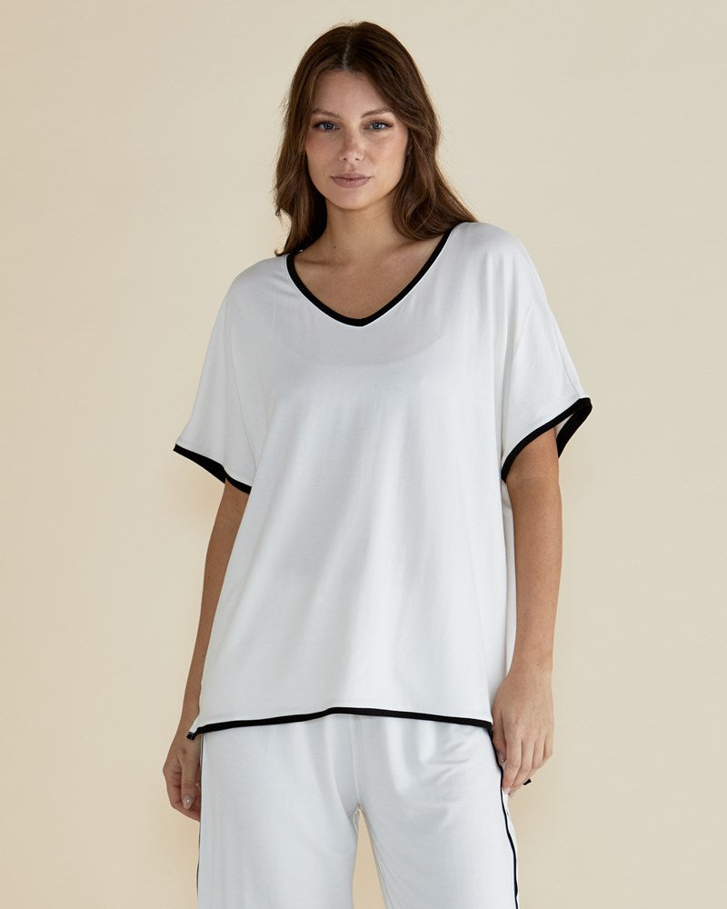 Image of a model wearing Tops. Productname: Betty Basics Clara Tee White in White colour by brand - Betty Basics