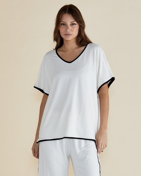 Image of a model wearing Tops. Productname: Betty Basics Clara Tee White in White colour by brand - Betty Basics