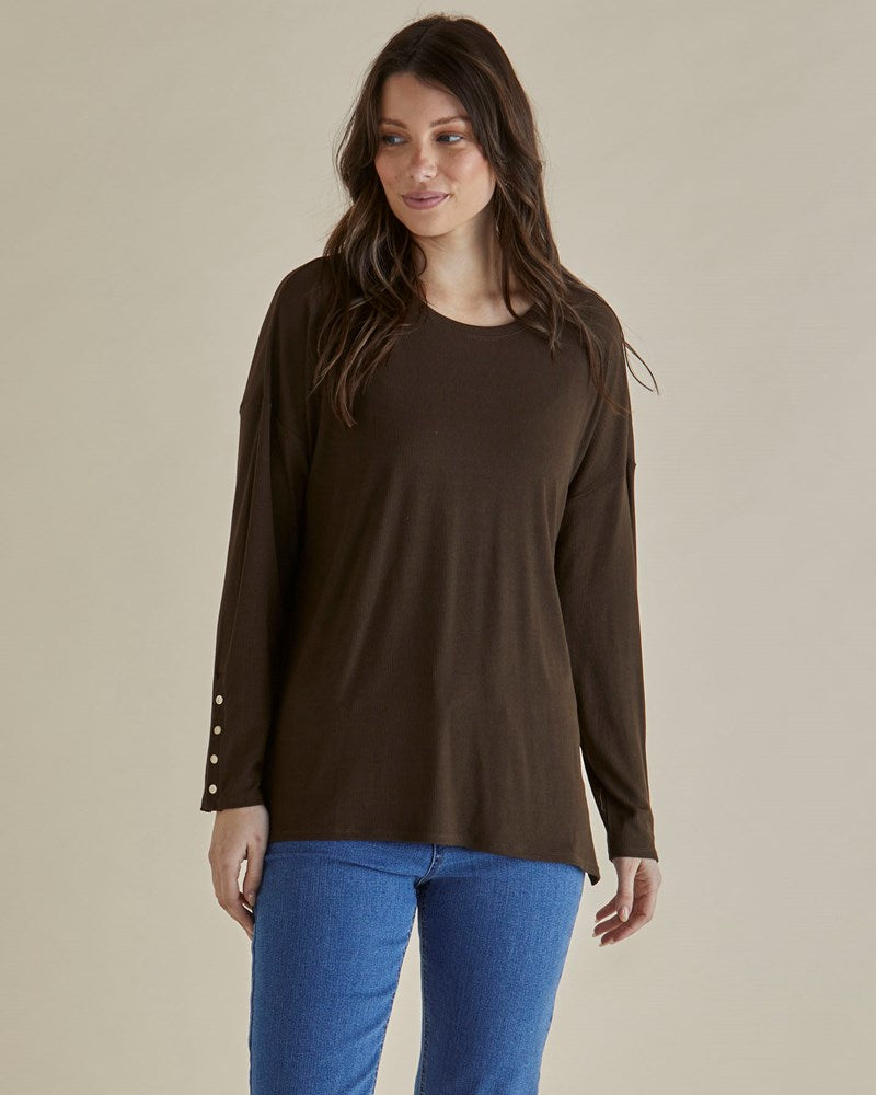 Image of a model wearing Tops. Productname: Betty Basics Hendrix Ribbed Long Sleeve Tee Brown in Brown colour by brand - Betty Basics