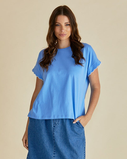 Image of a model wearing Tops. Productname: Betty Basics Sloane Scallop Tee Cornflour Blue in Cornflour Blue colour by brand - Betty Basics