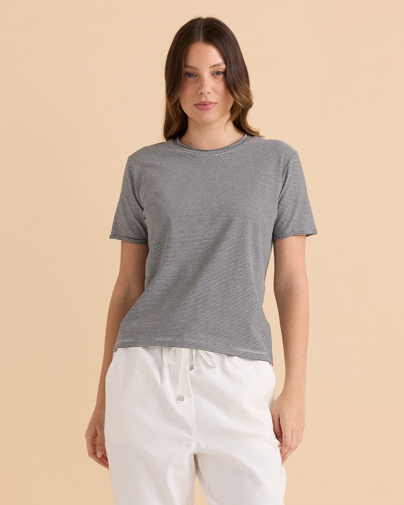 Image of a model wearing Tops. Productname: Betty Basics Cotton Slim Fit Tee Black Stripe in Black Stripe colour by brand - Betty Basics