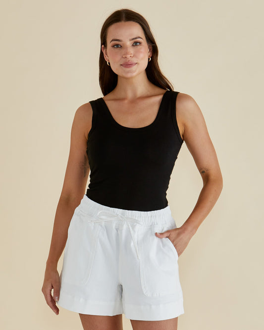 Image of a model wearing Tops. Productname: Betty Basics Emma Scoop Tank Black in Black colour by brand - Betty Basics