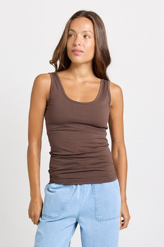 Image of a model wearing Tops. Product name - Emma Scoop Tank in Chocolate colour by brand - Betty Basics